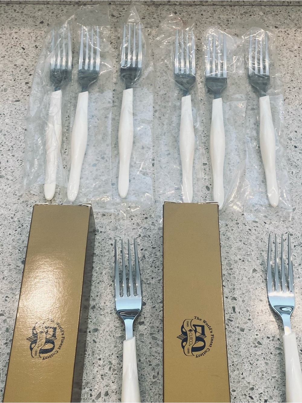 8 dinner forks, 4 salad forks, 8 soup spoons, and 4 tablespoons.